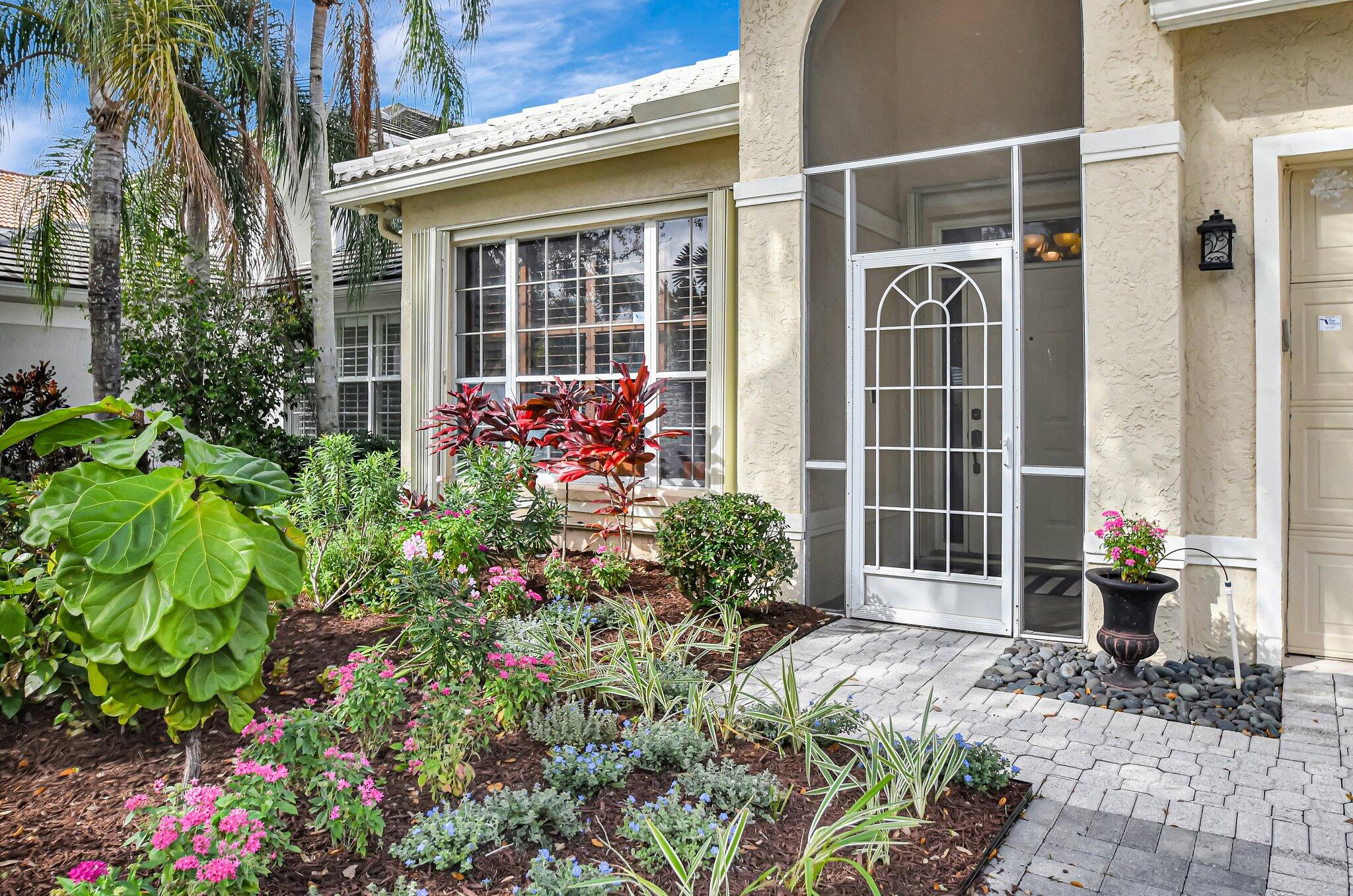 10929 Old Bridgeport Lane Boca Raton, FL 33498 - Photo 5 of 43 Front with garden