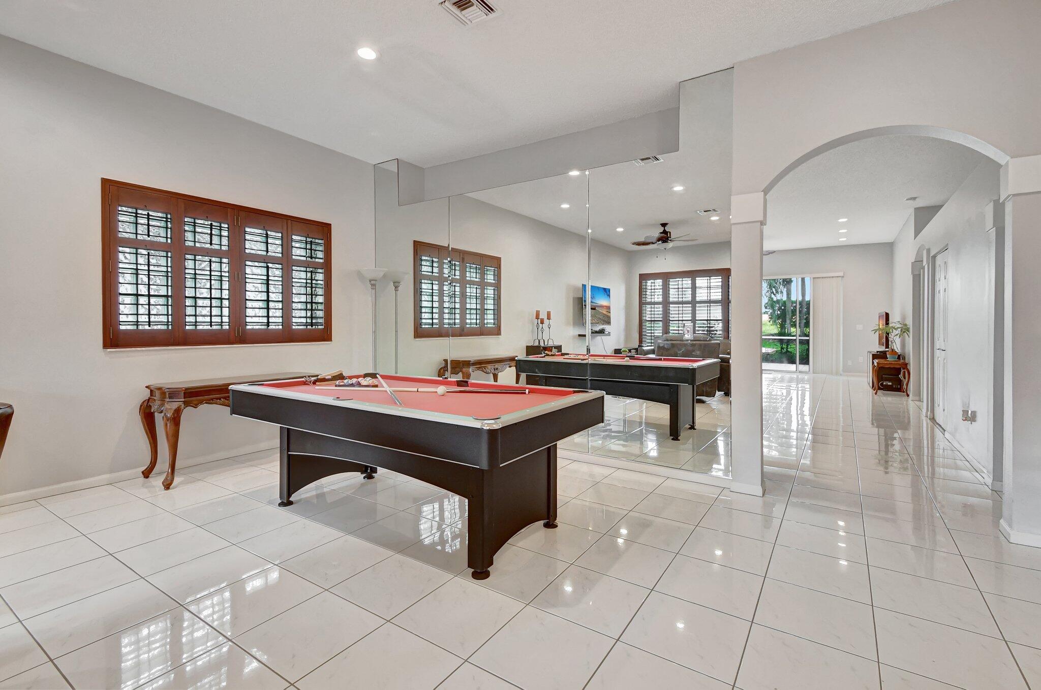 10929 Old Bridgeport Lane Boca Raton, FL 33498 - Photo 7 of 43 Family room with entry to living room