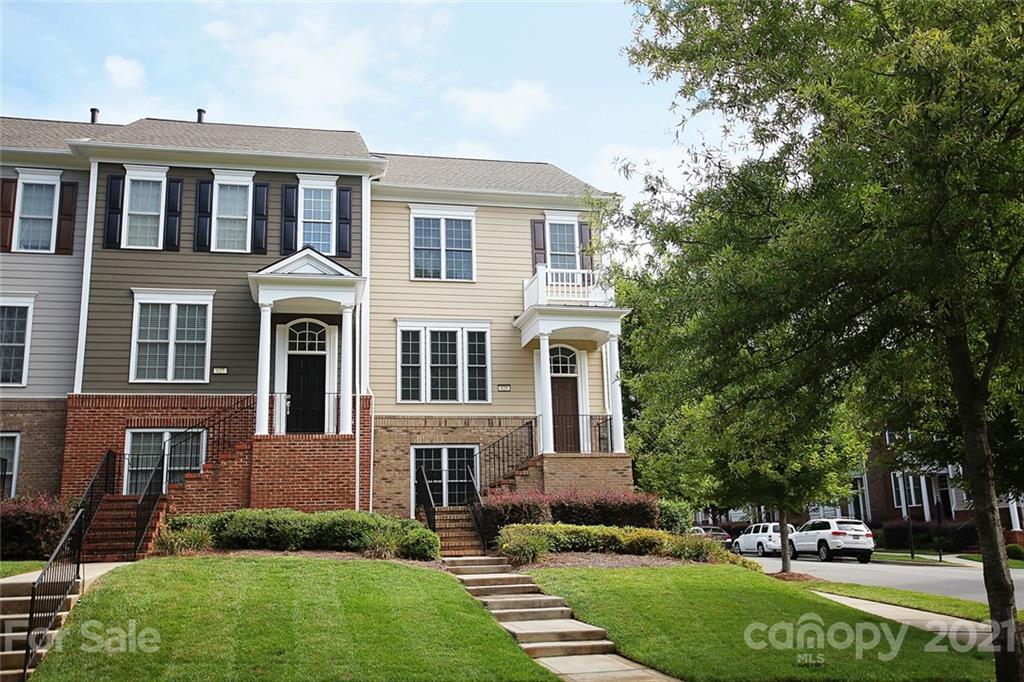 629 6th Baxter Crossing Fort Mill, SC 29708 - Photo 2 of 31 a front view of a house with a yard