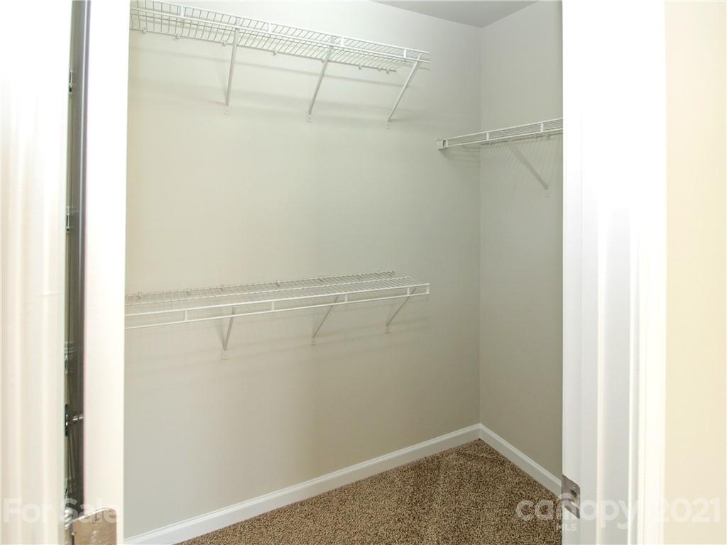 629 6th Baxter Crossing Fort Mill, SC 29708 - Photo 15 of 31 a view of small space with racks on the wall