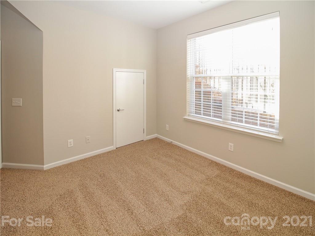 629 6th Baxter Crossing Fort Mill, SC 29708 - Photo 25 of 31 a view of an empty room with a window