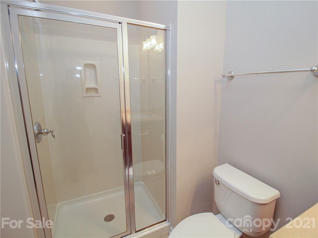 629 6th Baxter Crossing Fort Mill, SC 29708 - Photo 27 of 31 a bathroom with a shower a toilet and a sink