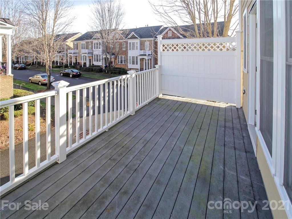 629 6th Baxter Crossing Fort Mill, SC 29708 - Photo 28 of 31 a view of a balcony with wooden floor