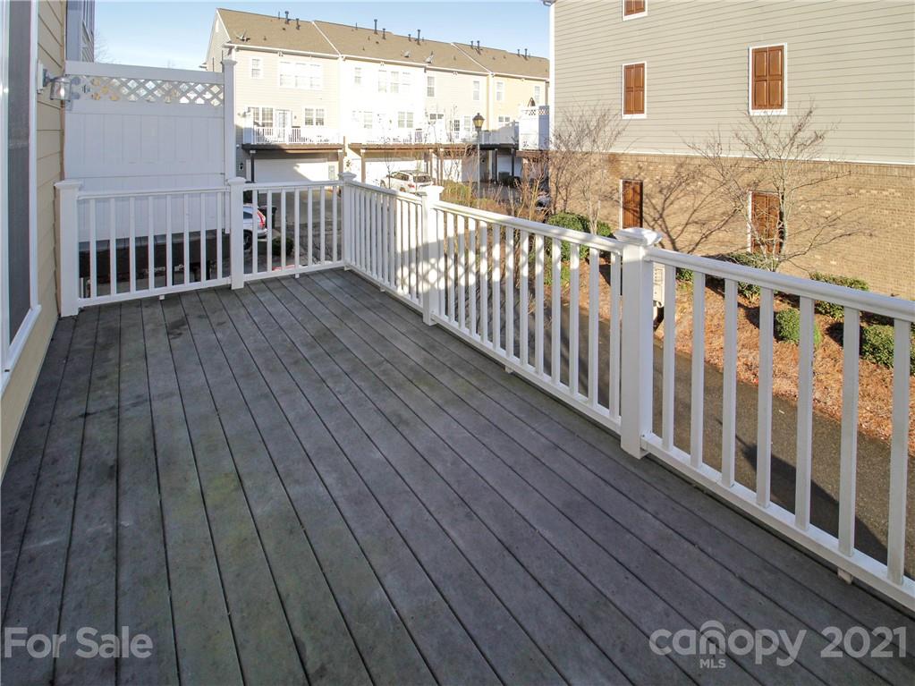 629 6th Baxter Crossing Fort Mill, SC 29708 - Photo 29 of 31 a view of a balcony with wooden floor