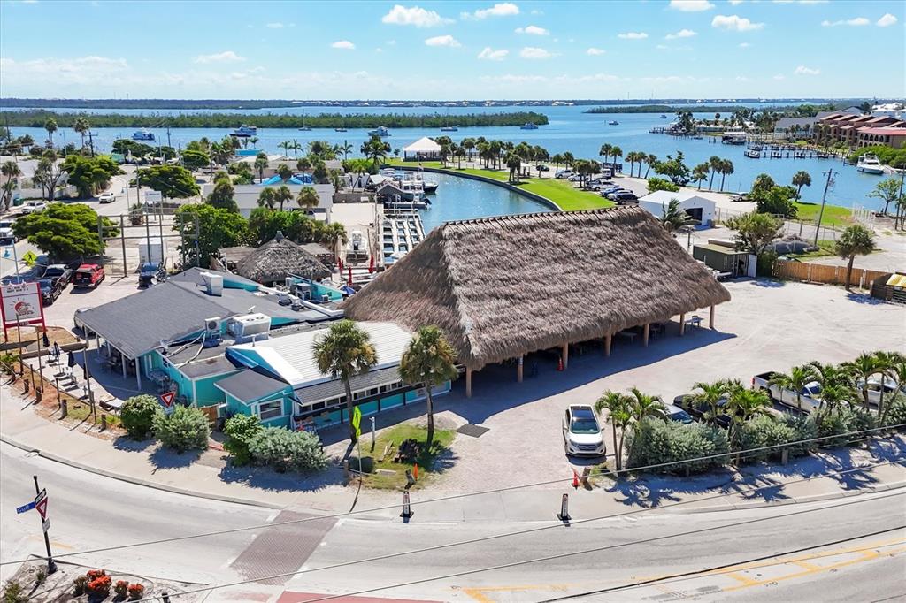 840 Park Road Englewood, FL 34223 - Photo 67 of 76 an aerial view of a house with a garden and plants
