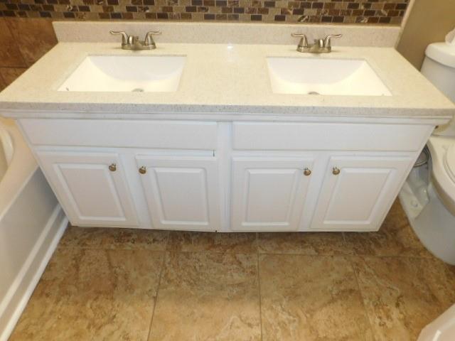 1795 Devon Drive Atlanta, GA 30311 - Photo 18 of 26 a bathroom with a sink