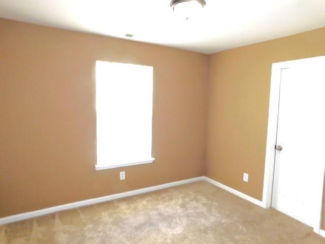 1795 Devon Drive Atlanta, GA 30311 - Photo 21 of 26 a view of an empty room with a window