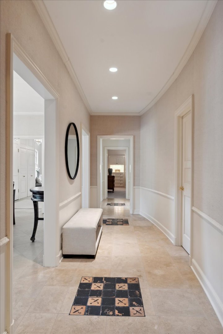 999 Hill Road Winnetka, IL 60093 - Photo 15 of 52 a living room with furniture a mirror and white walls