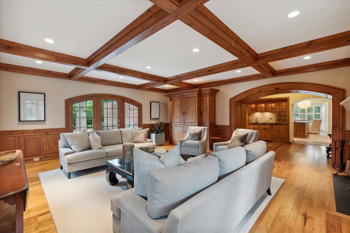 999 Hill Road Winnetka, IL 60093 - Photo 23 of 52 a living room with furniture and a large window