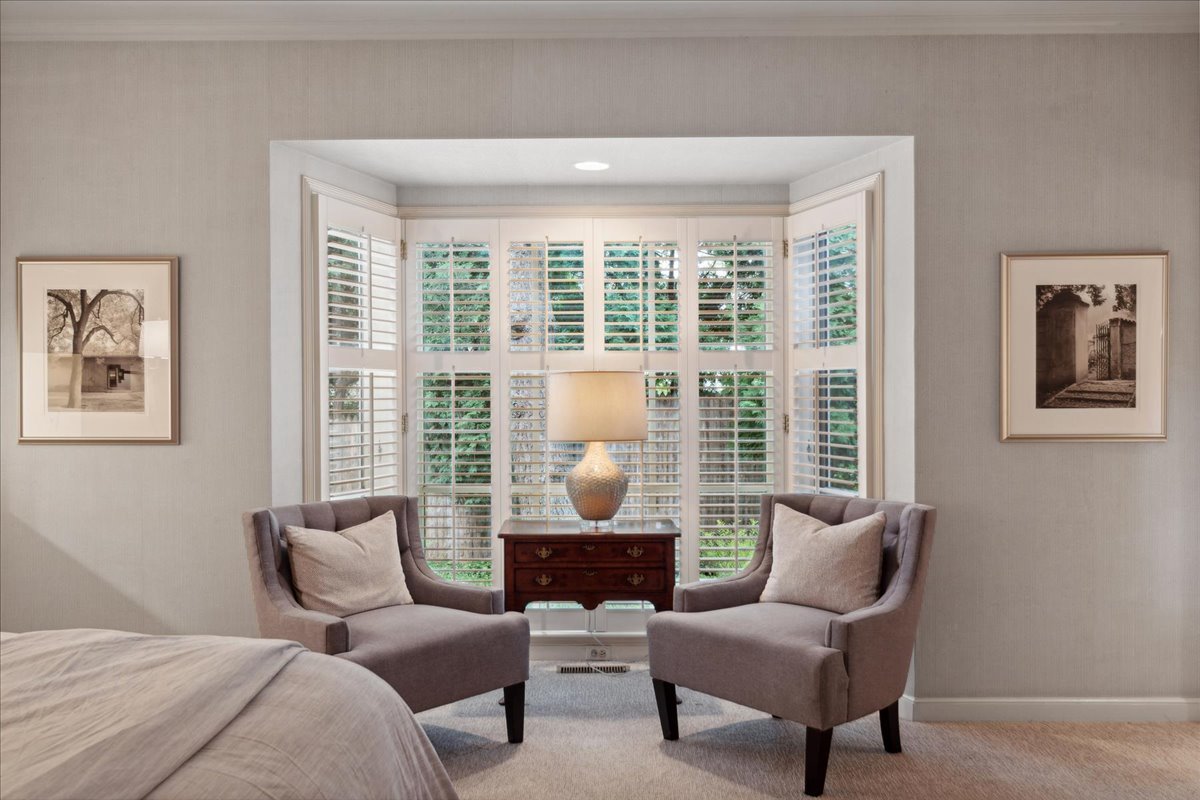 999 Hill Road Winnetka, IL 60093 - Photo 27 of 52 a living room with furniture and a large window