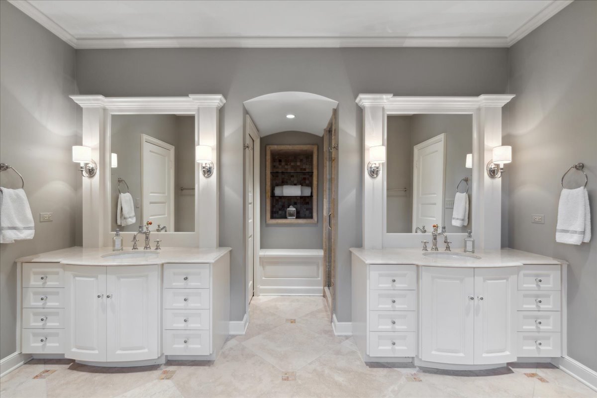 999 Hill Road Winnetka, IL 60093 - Photo 28 of 52 a bathroom with a double vanity sink mirror and