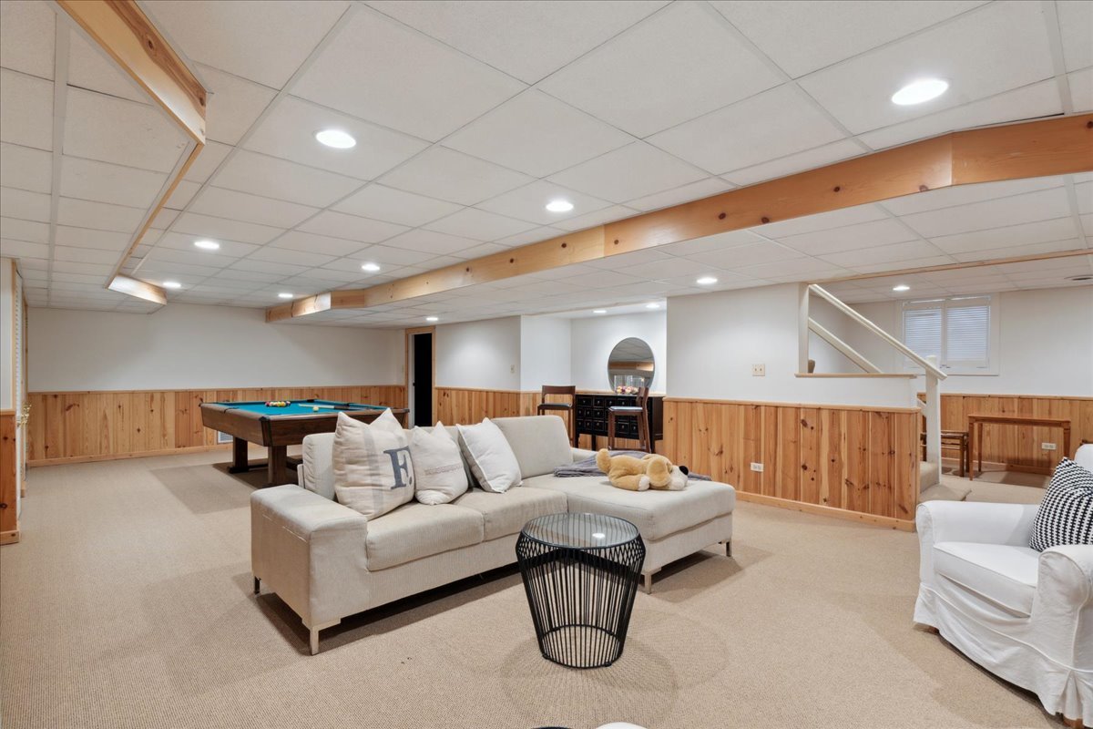 999 Hill Road Winnetka, IL 60093 - Photo 41 of 52 a living room with furniture and a table