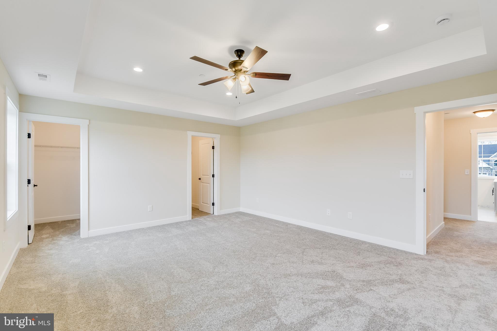 503 South Farm Crossing Road Severn, MD 21144 - Photo 28 of 46 an empty room with closet and a ceiling fan