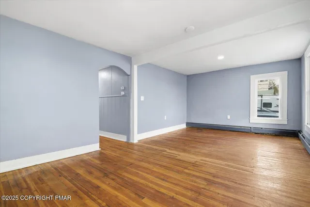 a kitchen with granite countertop a stove and a microwave oven