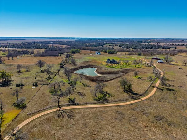an aerial view of a water pond