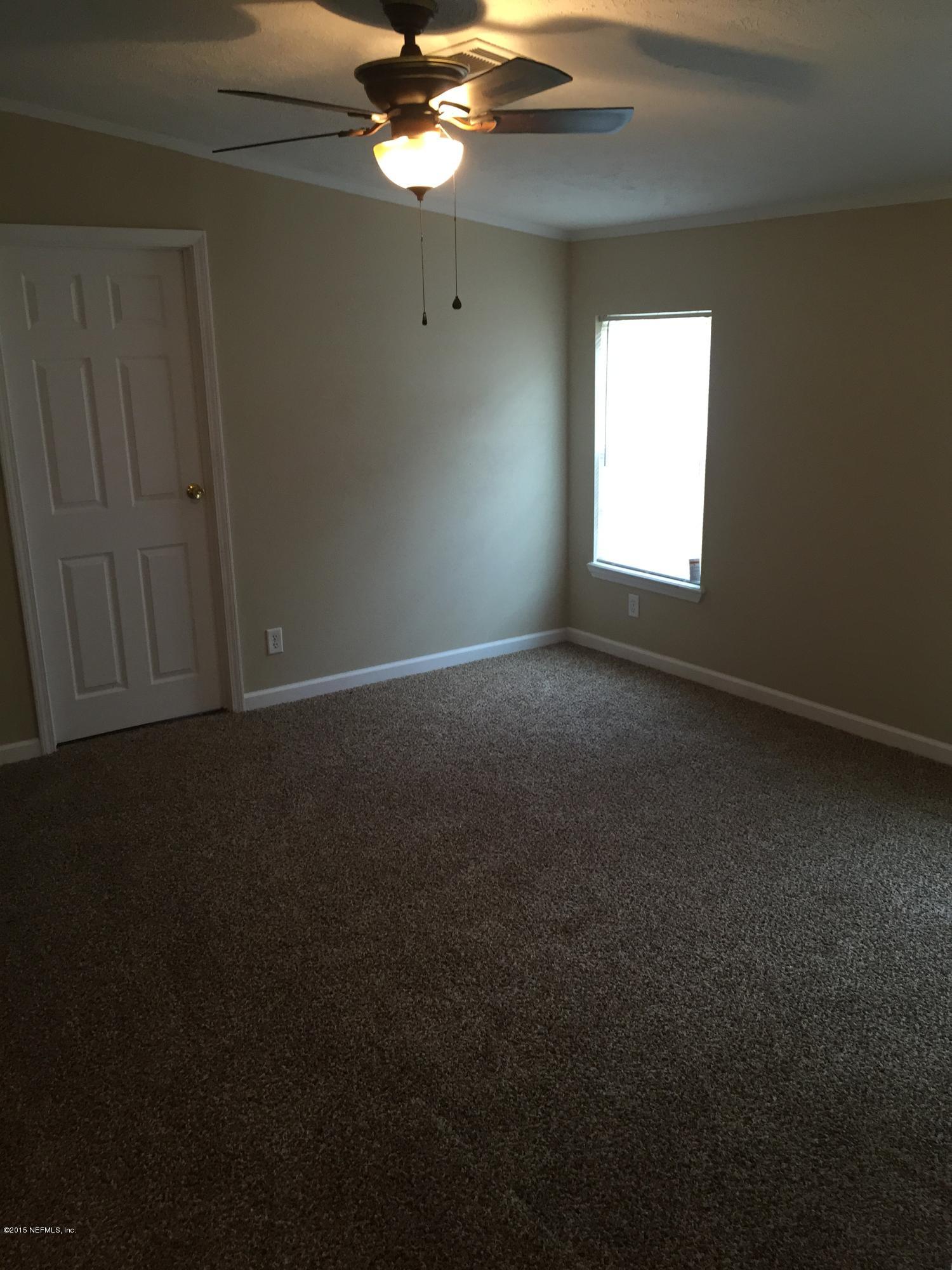 4653 Calendula Avenue Middleburg, FL 32068 - Photo 16 of 50 a view of empty room with window