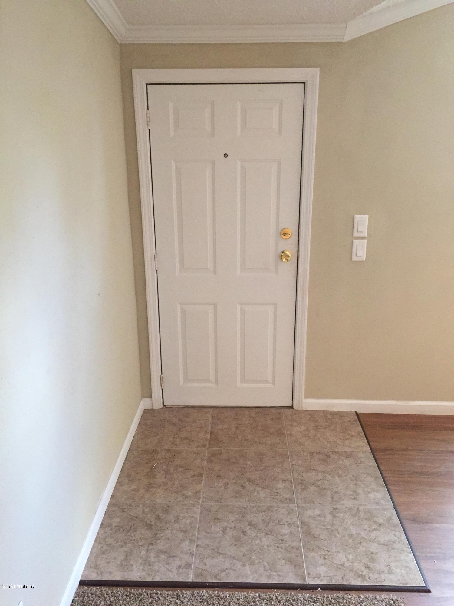 4653 Calendula Avenue Middleburg, FL 32068 - Photo 23 of 50 an empty room with wooden floor