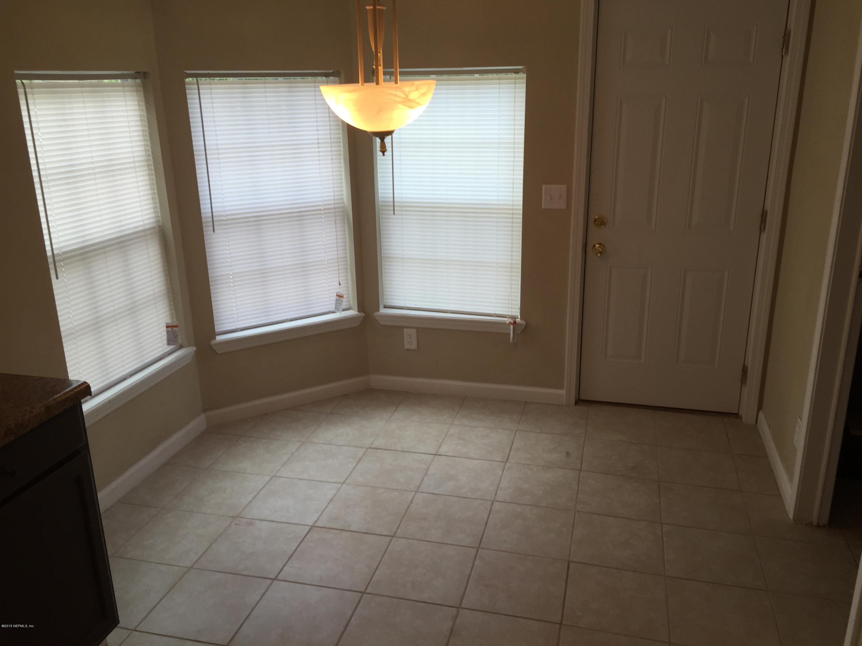 4653 Calendula Avenue Middleburg, FL 32068 - Photo 28 of 50 a view of an empty room with a window