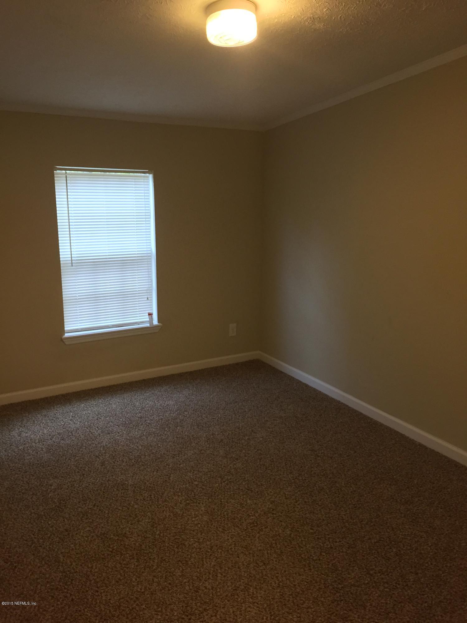 4653 Calendula Avenue Middleburg, FL 32068 - Photo 38 of 50 an empty room with a window