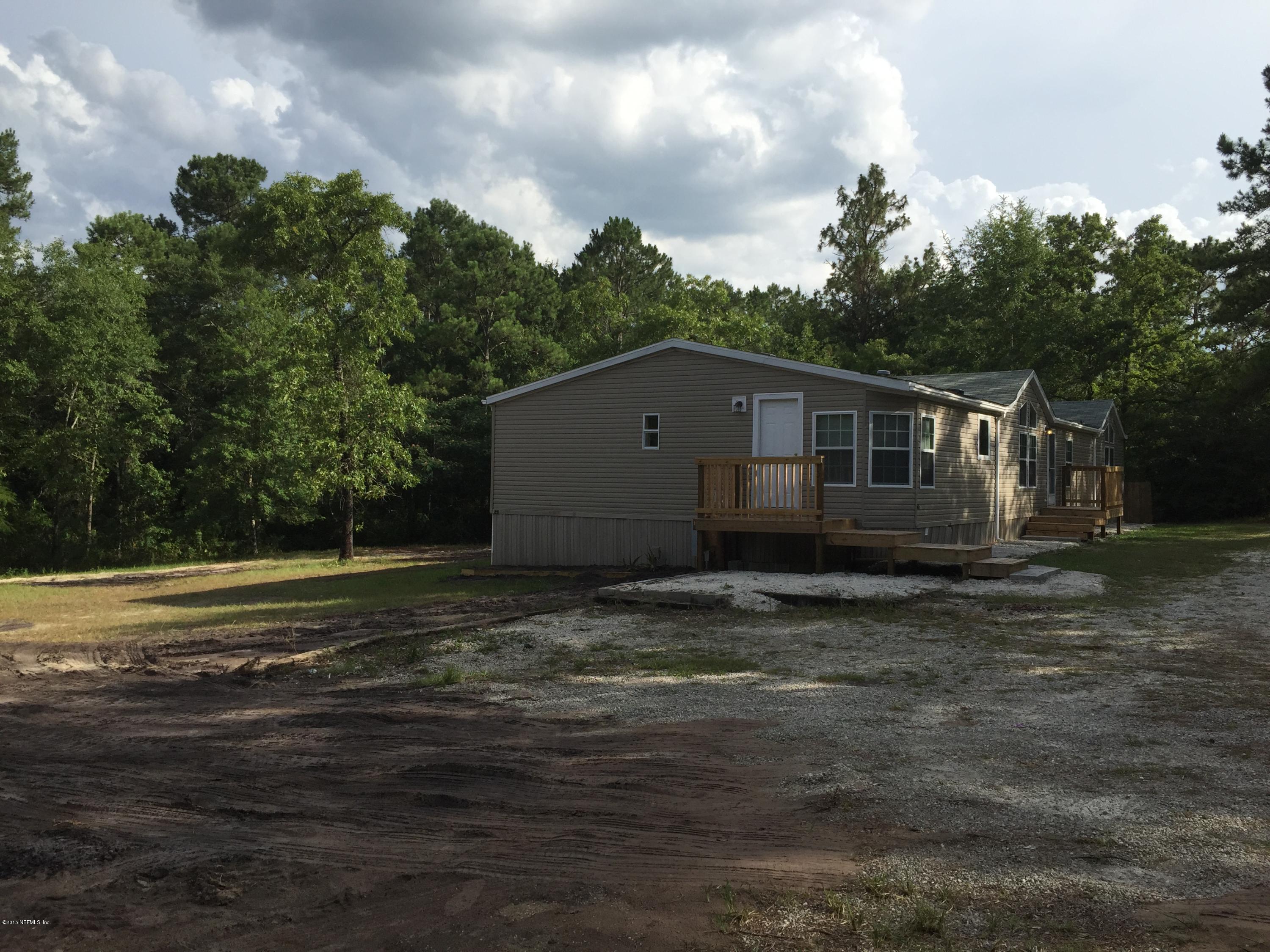 4653 Calendula Avenue Middleburg, FL 32068 - Photo 4 of 50 a backyard of a house