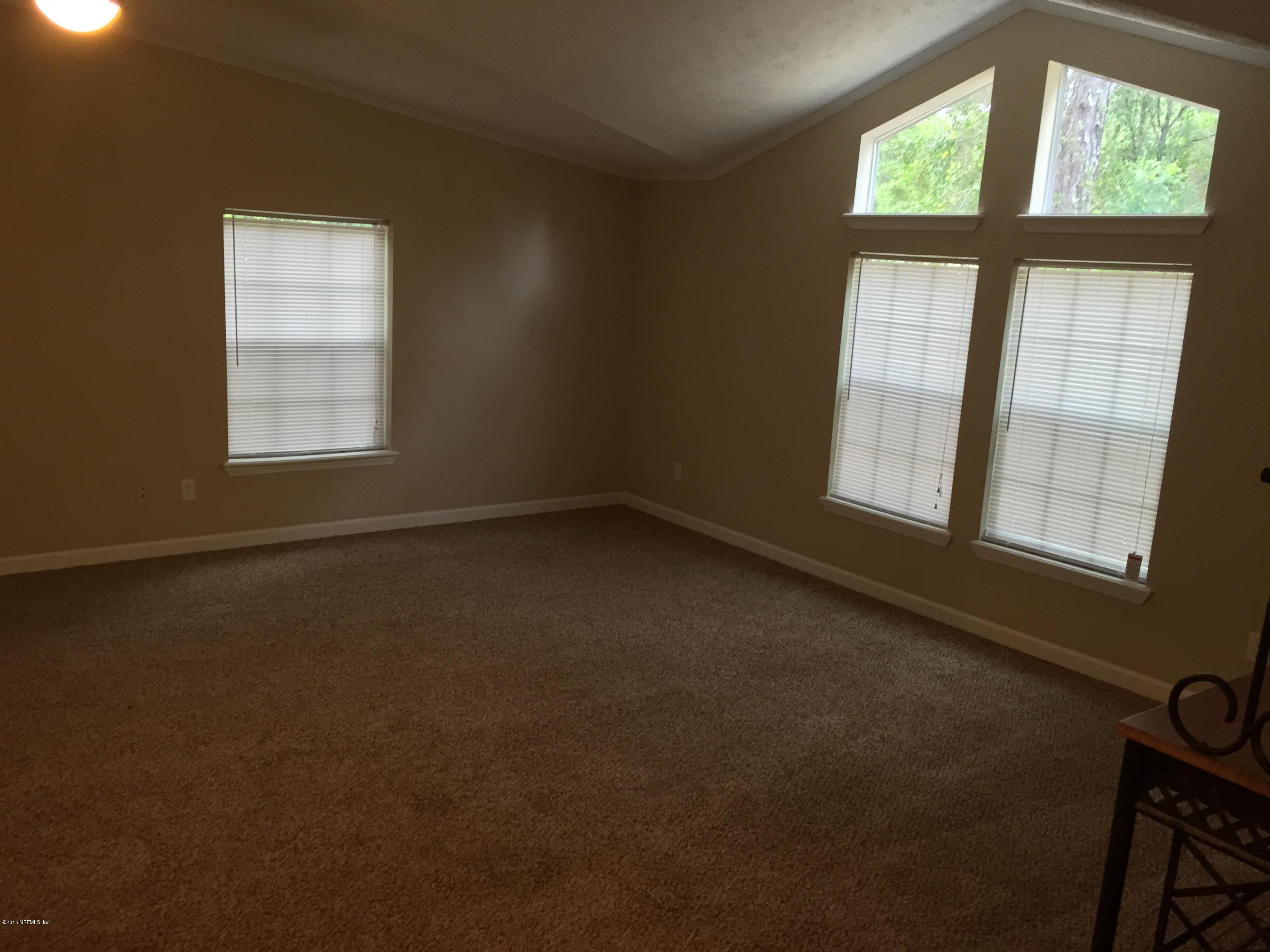 4653 Calendula Avenue Middleburg, FL 32068 - Photo 41 of 50 an empty room with a window