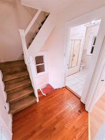 a view of a hallway with staircase