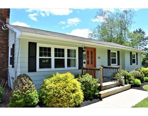 165 Brickyard Road Southampton, MA 01073 - Photo 1 of 22 a front view of a house with a lots of potted plants