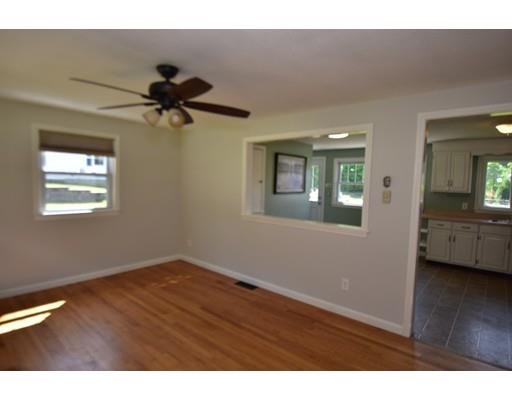 165 Brickyard Road Southampton, MA 01073 - Photo 13 of 22 a view of an empty room with wooden floor and a window