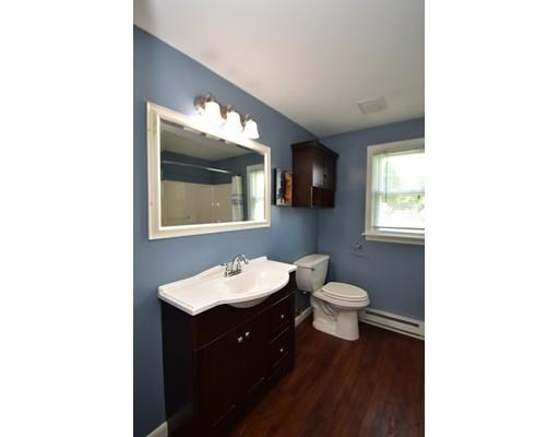 165 Brickyard Road Southampton, MA 01073 - Photo 19 of 22 a bathroom with a toilet sink and mirror