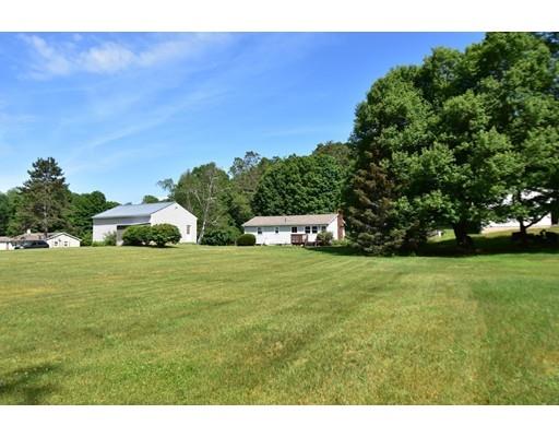 165 Brickyard Road Southampton, MA 01073 - Photo 6 of 22 a front view of a house with a garden