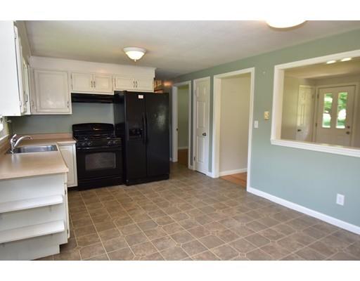 165 Brickyard Road Southampton, MA 01073 - Photo 8 of 22 a kitchen with granite countertop a refrigerator and a sink