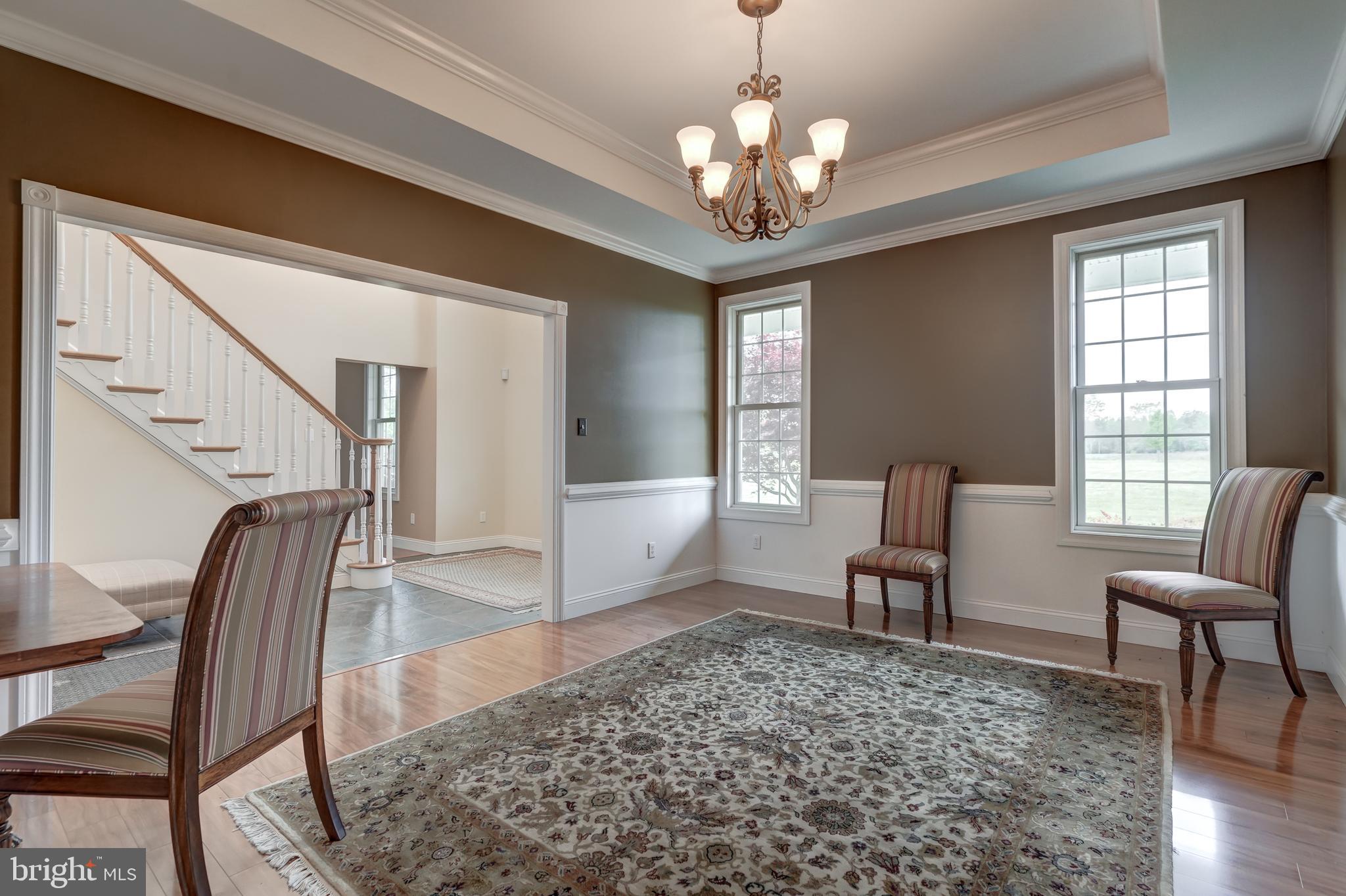 2066 Byrd's Mill Road Newtown, VA 23126 - Photo 20 of 61 a view of a livingroom with furniture window and wooden floor