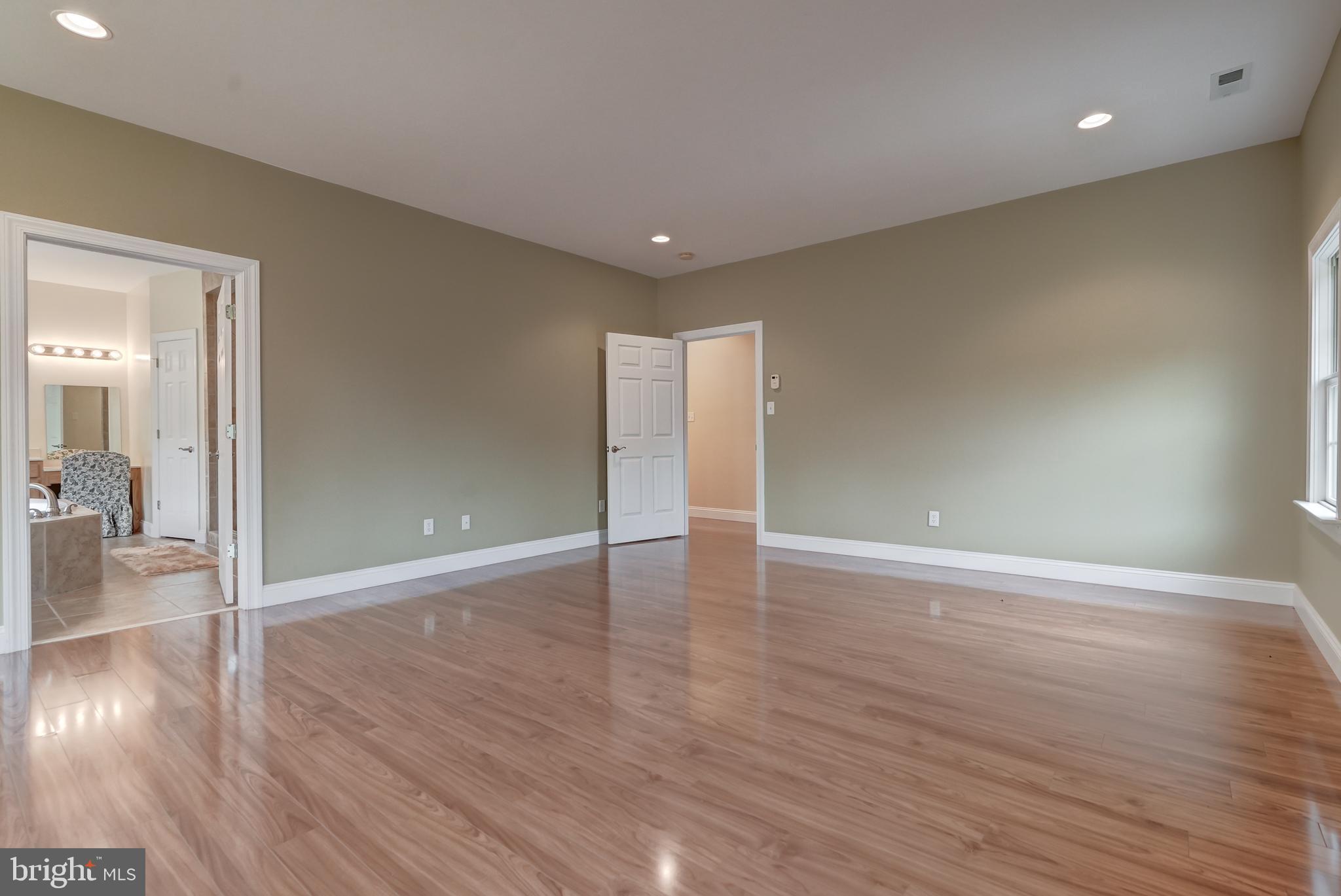 2066 Byrd's Mill Road Newtown, VA 23126 - Photo 24 of 61 a view of a livingroom with wooden floor