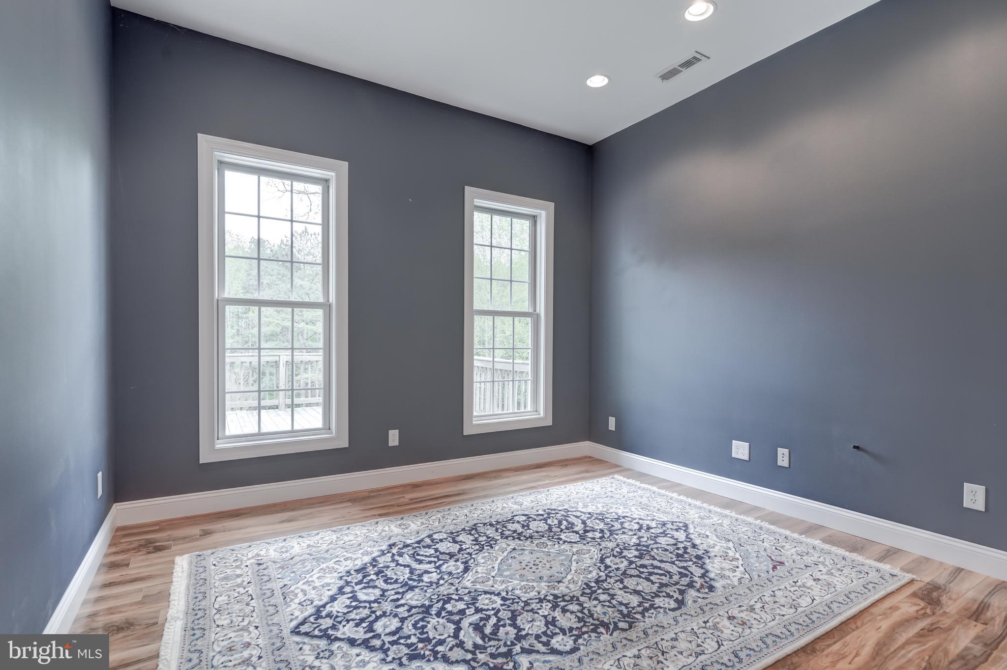 2066 Byrd's Mill Road Newtown, VA 23126 - Photo 29 of 61 a view of an empty room and window