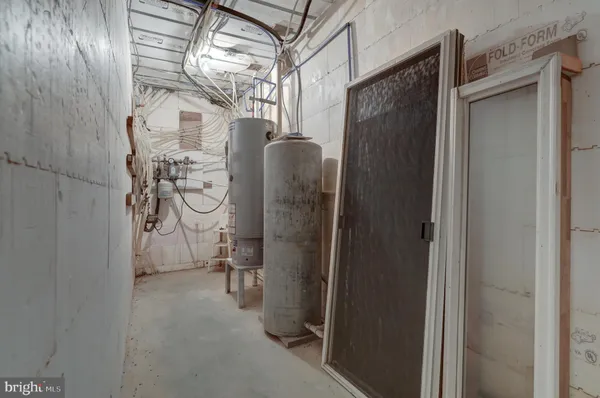 a view of a field with trees in the background