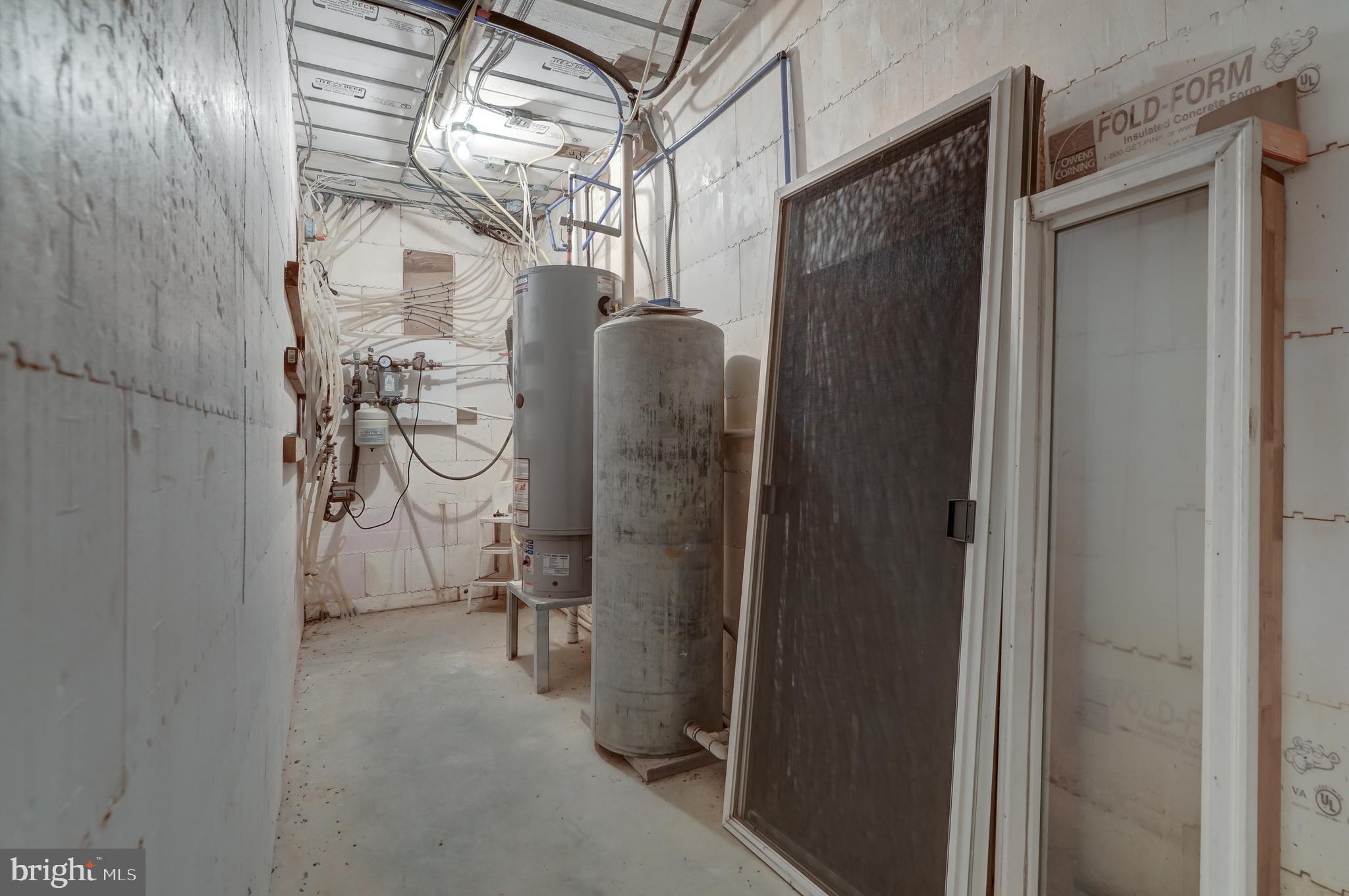 2066 Byrd's Mill Road Newtown, VA 23126 - Photo 44 of 61 a view of entryway with wooden walls