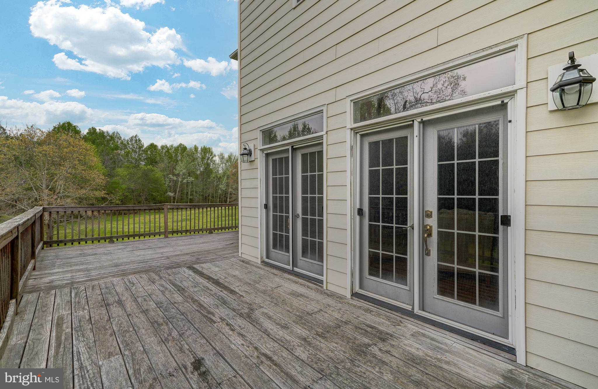 2066 Byrd's Mill Road Newtown, VA 23126 - Photo 49 of 61 a view of a house with a large window and wooden floor
