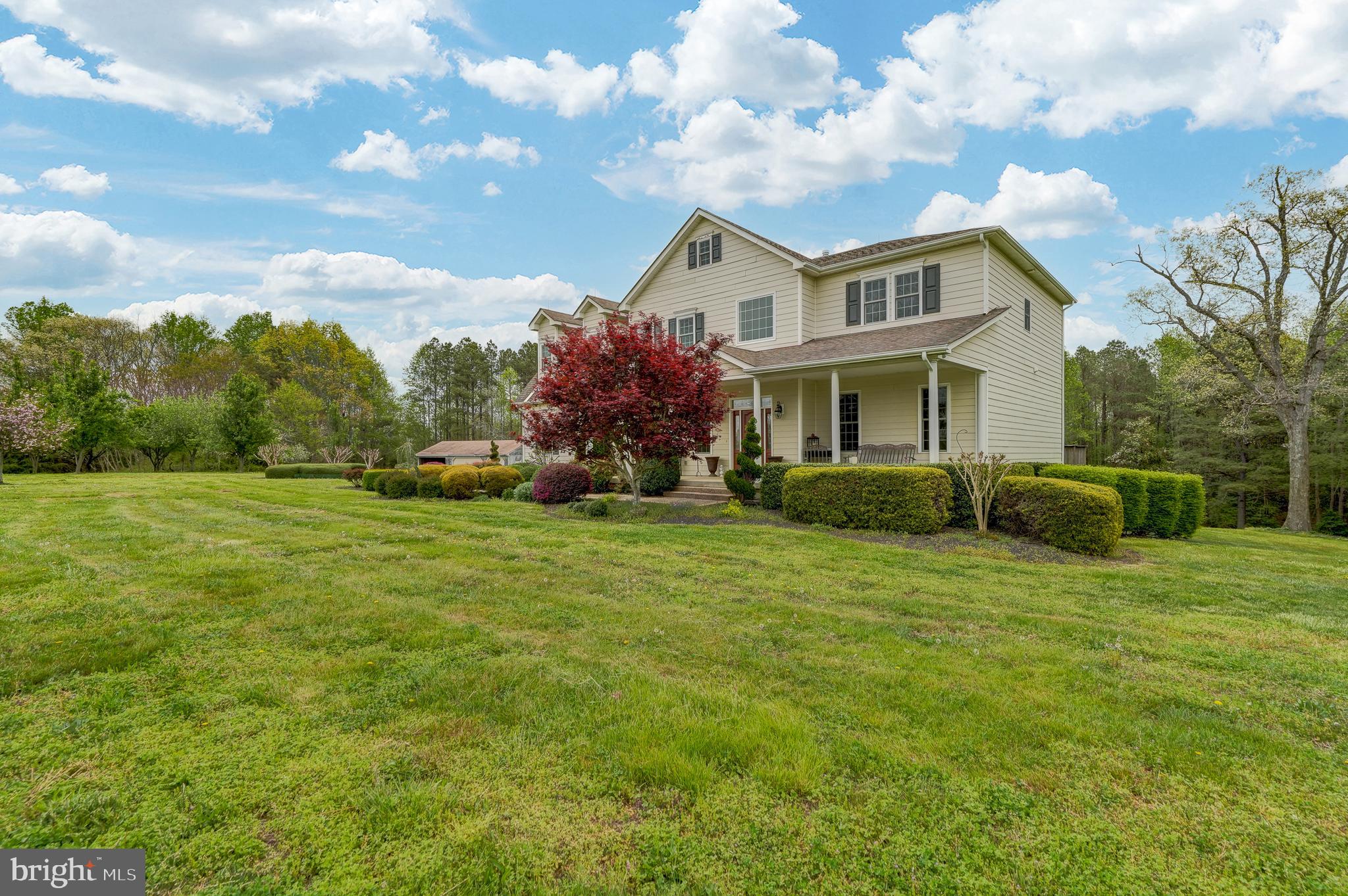 2066 Byrd's Mill Road Newtown, VA 23126 - Photo 57 of 61 a front view of a house with garden