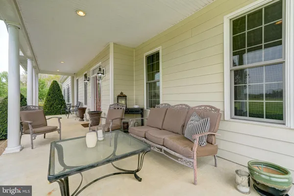 a kitchen with stainless steel appliances granite countertop a refrigerator sink and cabinets
