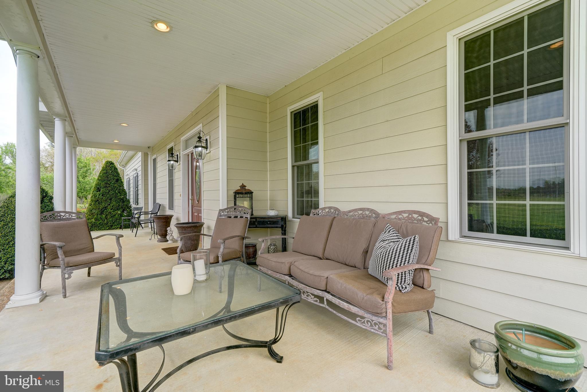 2066 Byrd's Mill Road Newtown, VA 23126 - Photo 9 of 61 a living room with furniture and a large window