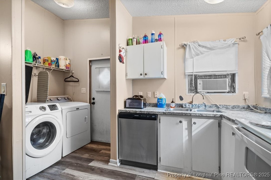 538 Participle Court Hope Mills, NC 28348 - Photo 12 of 32 a kitchen with stainless steel appliances granite countertop a sink stove and refrigerator