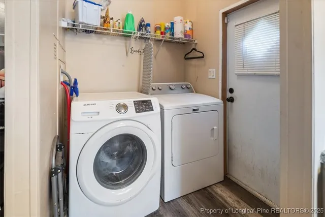 a utility room with dryer and washer