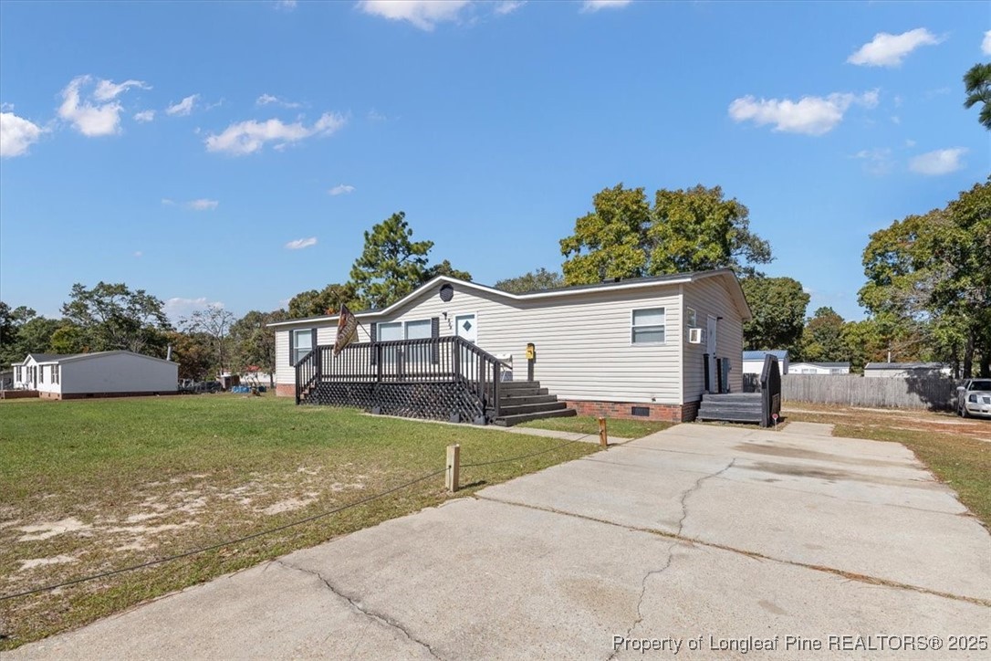 538 Participle Court Hope Mills, NC 28348 - Photo 3 of 32 a view of a house with a patio