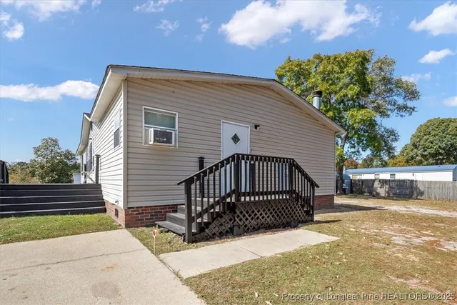 a view of a house with a roof deck