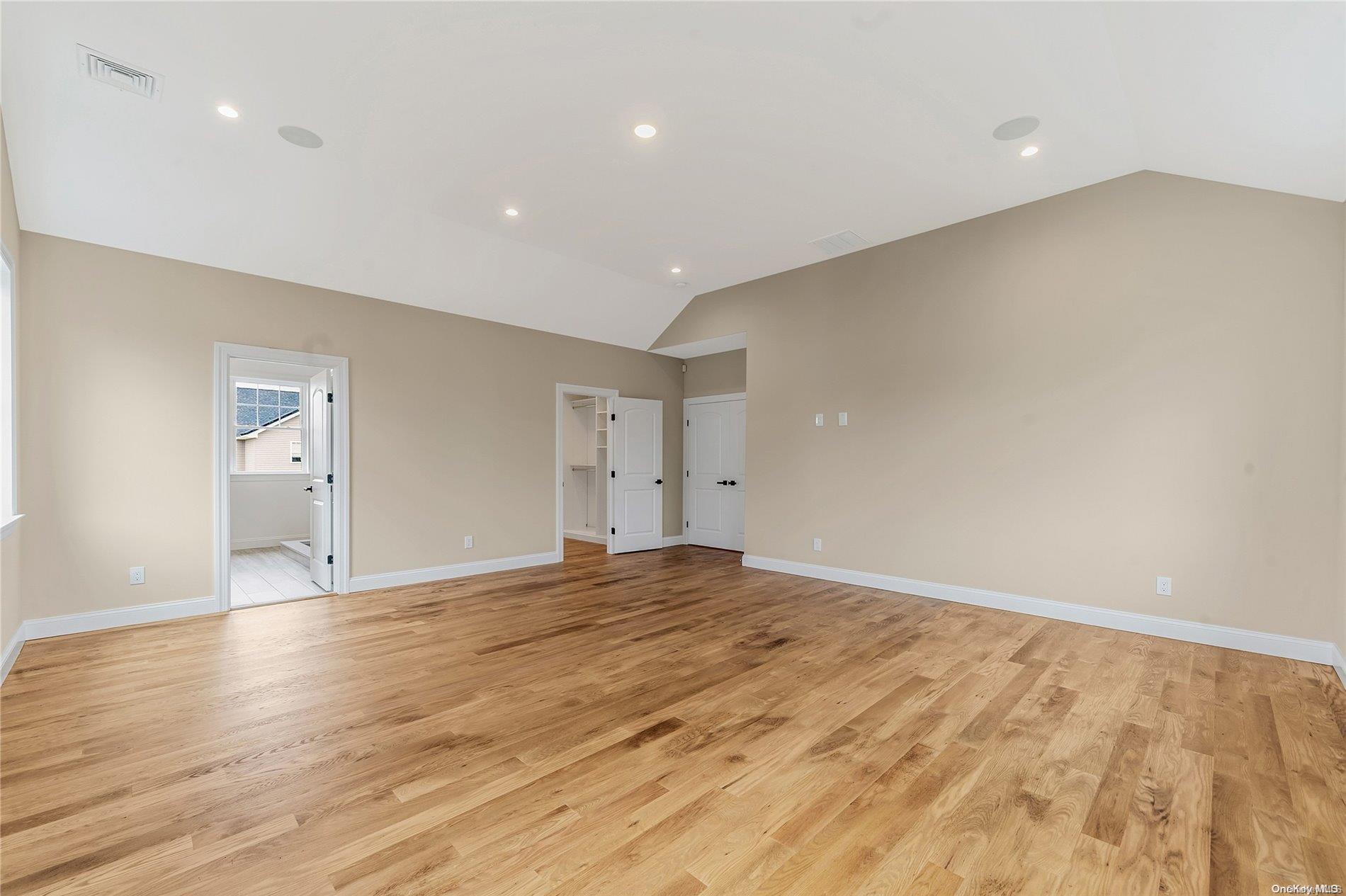 Lot 9 Sycamore Estates Nesconset, NY 11767 - Photo 34 of 35 a view of empty room with wooden floor