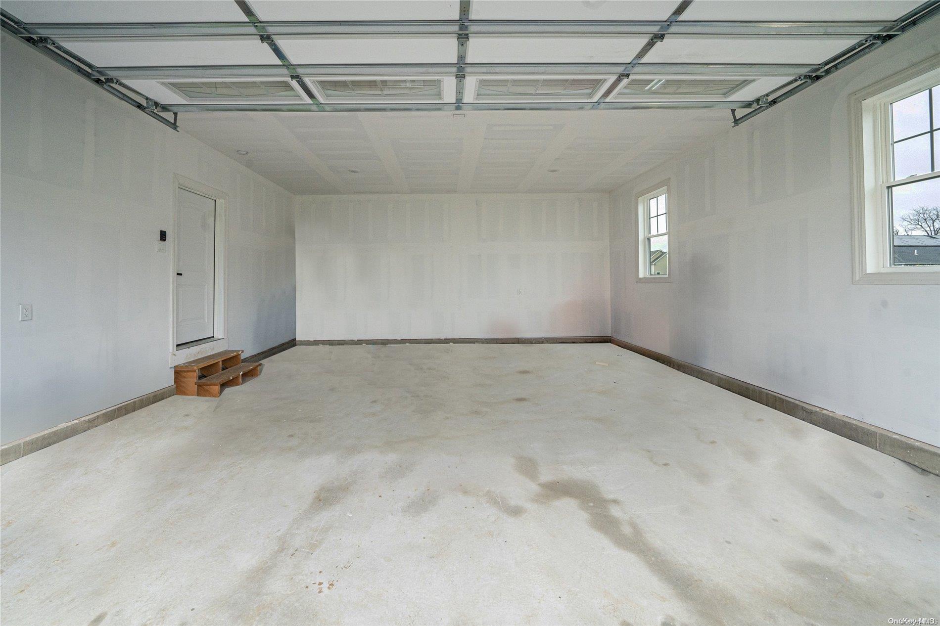 Lot 9 Sycamore Estates Nesconset, NY 11767 - Photo 35 of 35 a view of a room with rack and windows
