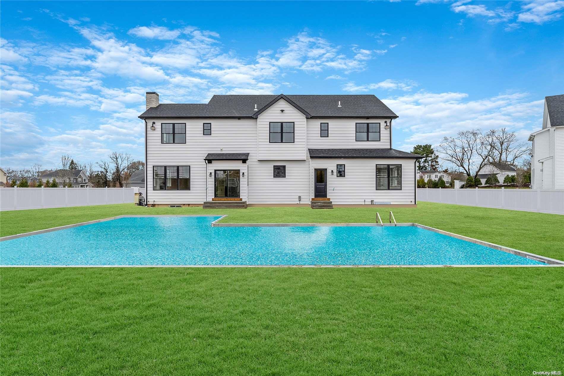 Lot 9 Sycamore Estates Nesconset, NY 11767 - Photo 6 of 35 a view of pool with a big yard and large trees