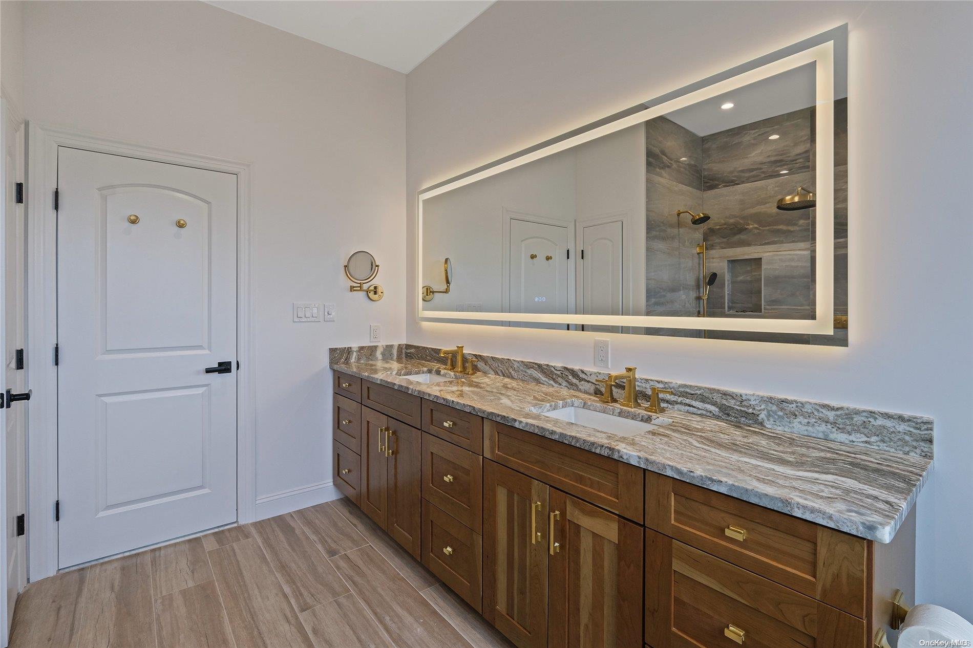 Lot 9 Sycamore Estates Nesconset, NY 11767 - Photo 10 of 35 a bathroom with a granite countertop sink mirror and double