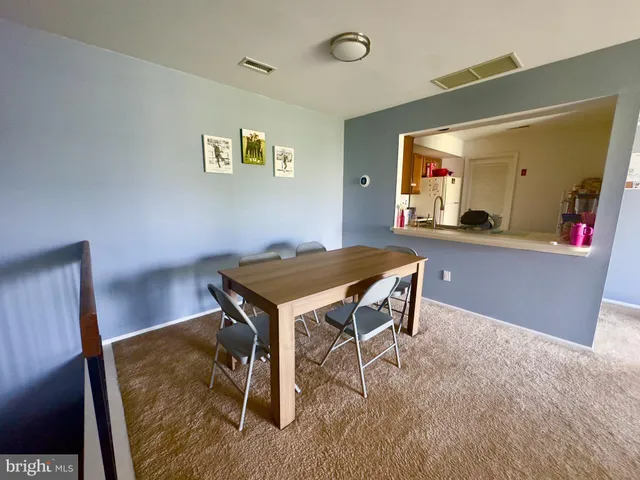 a view of a livingroom with furniture and window
