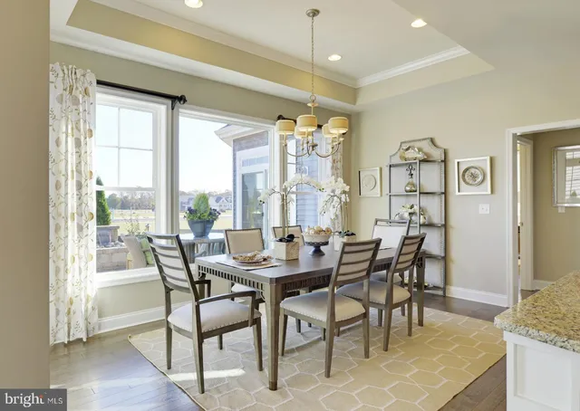 a spacious bathroom with a granite countertop sink mirror and a